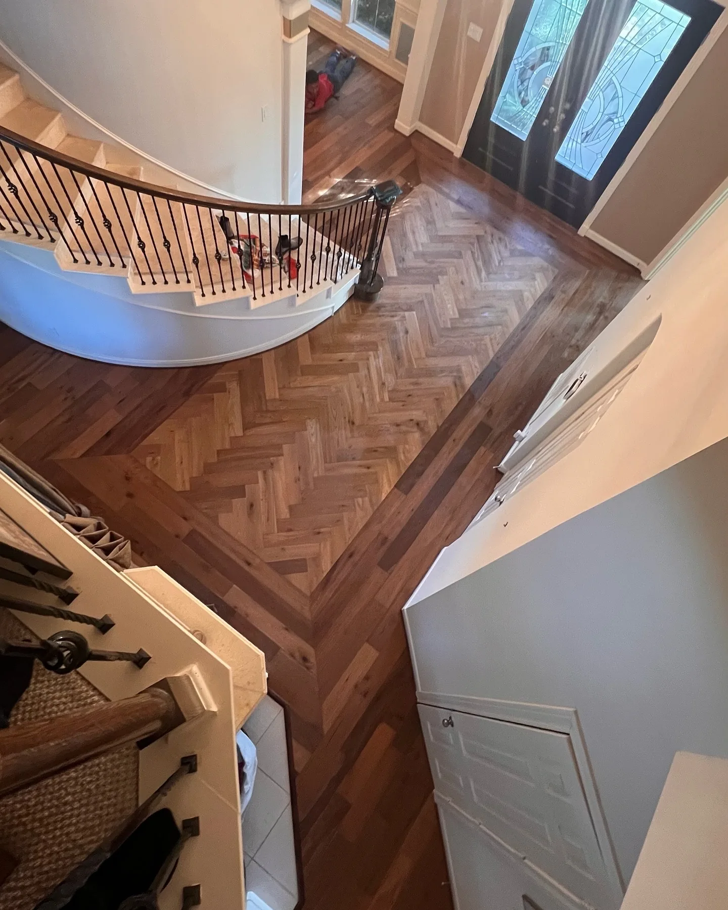 Herringbone engineered wood installation detail