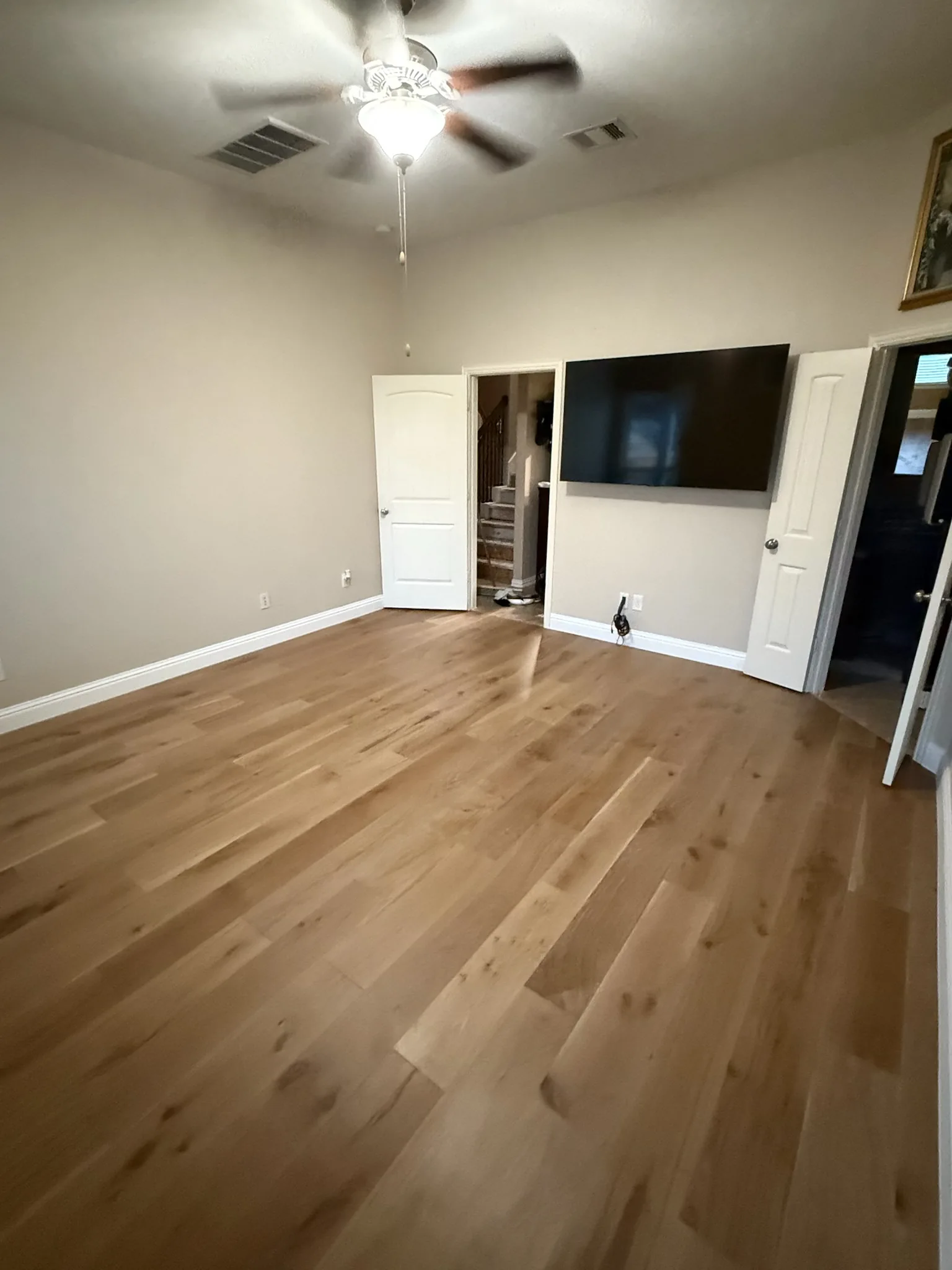 Natural engineered oak flooring with sunlight