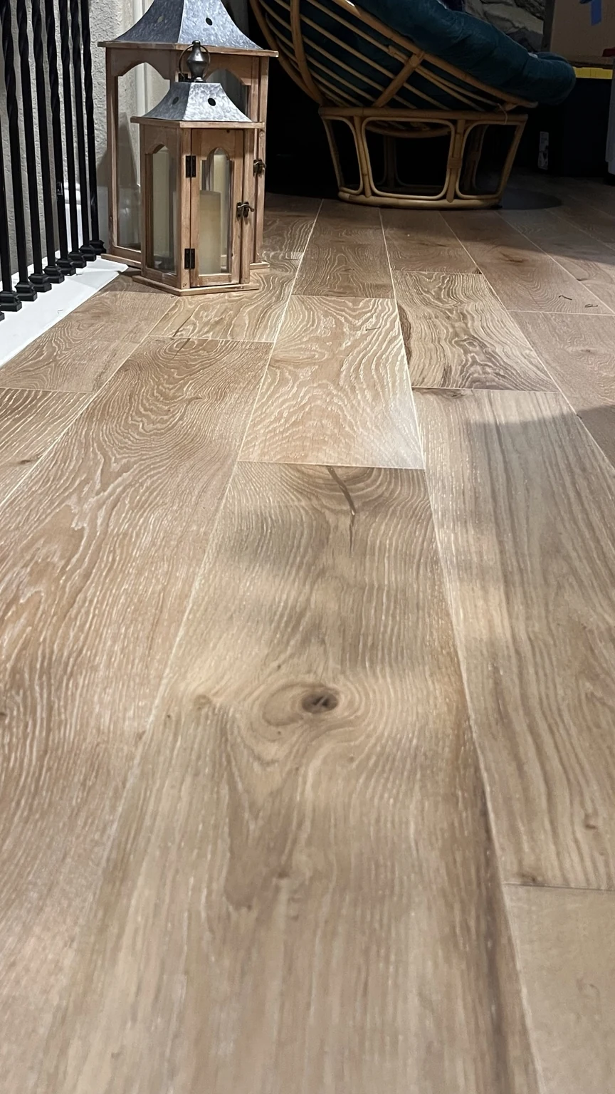 Engineered hardwood floor close-up with lantern decor