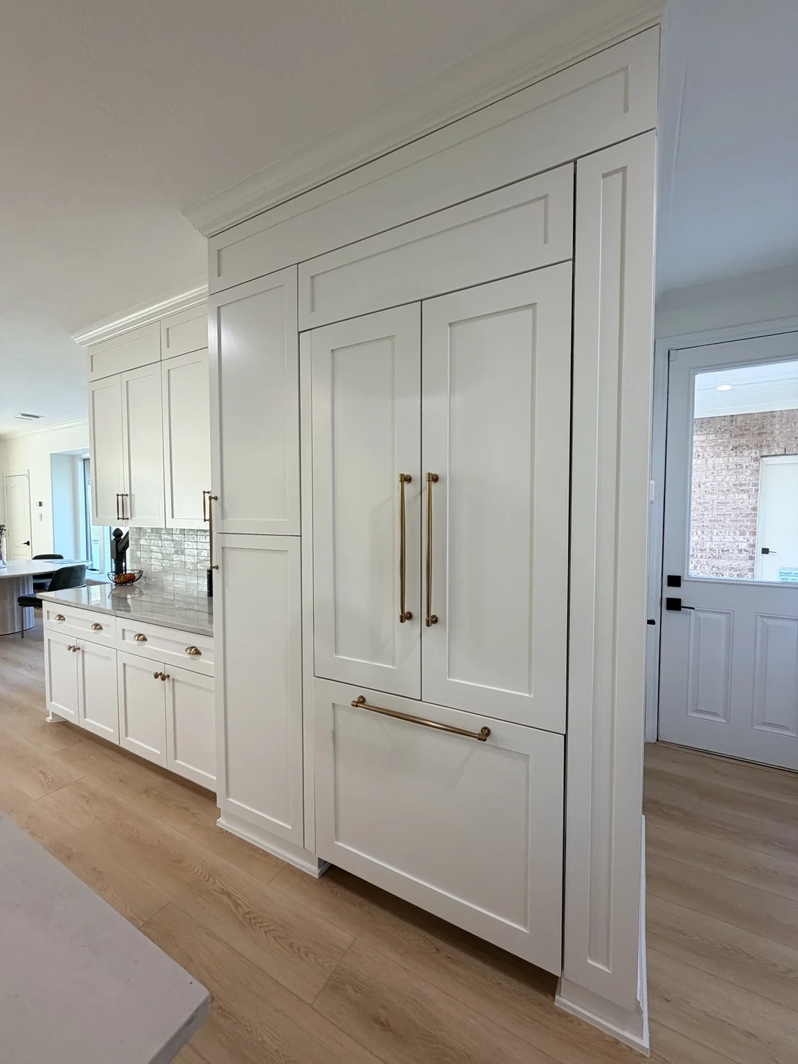 Cabinet refacing with custom refrigerator panels