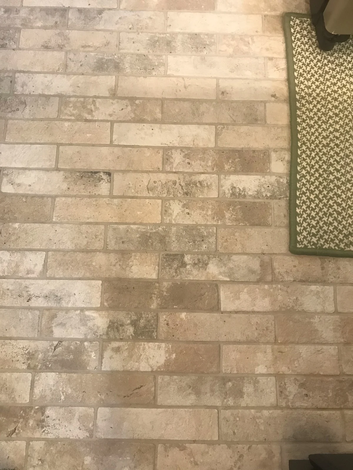 Beige and tan natural stone-look tile close-up